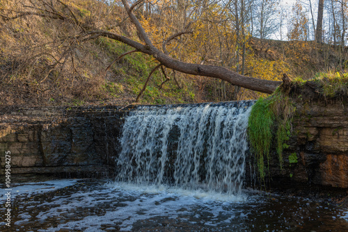 Sablinsky waterfall on a sunny October day. Leningrad region, Russia