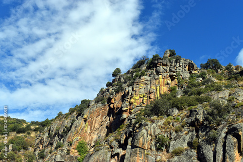 Granitic and metamorphic rocks with yellow lichens in the Arribes del Duero.