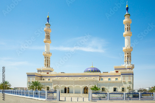 White omani mosque with two minarets, Jalan Bani Buhassan, sultanate Oman