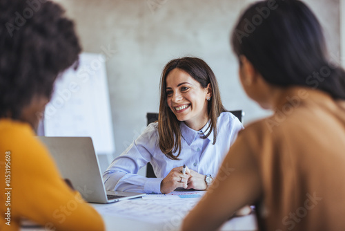 Smiling Businesswoman Leading a Productive Team Meeting