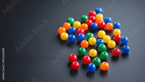 Colorful Plastic Beads on a Black Background.