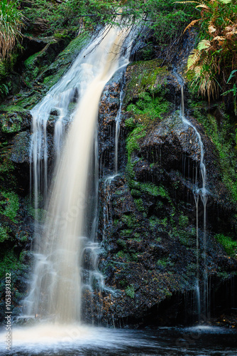 Portrait of Hindhope Linn, a waterfall located at the northern end of the Kielder Forest Drive in Northumberland