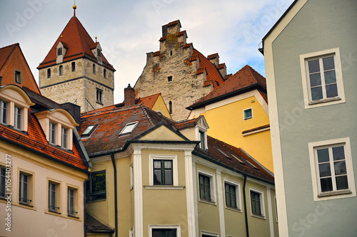 Colorful old buildings and stone tower in Regensburg Germany