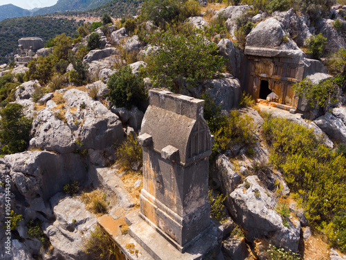 Rock tombs, tombstones and sarcophagi on a mountainside near the ancient city of Sura. Turkey