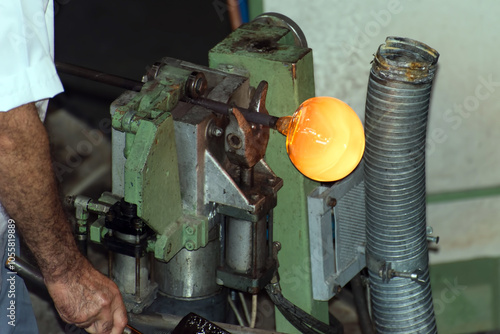 Detail of traditional glass making at the Hergiswill factory, Switzerland