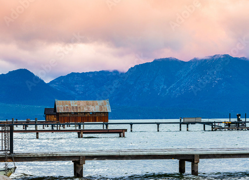 Cloudy Sunset Over Piers and Boathouse on Eldorado Beach, South Lake Tahoe, California, USA