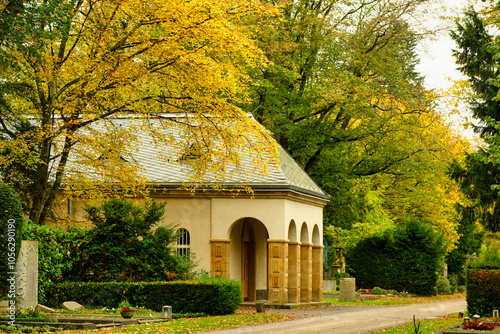 Neo-Romanesque-style building of the old mourning hall from 1881 at Cologne's Melaten cemetery now used as a columbarium in autumnal mood