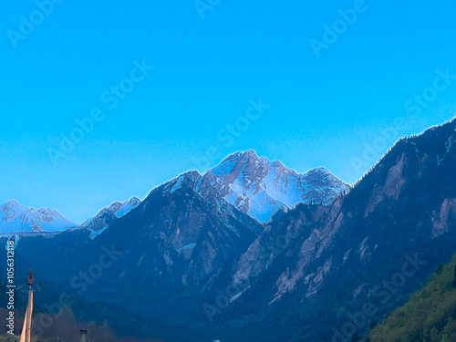 Jiuzhaigou Valley in Aba, Sichuan - Beautiful view of snow-capped mountains and blue sky