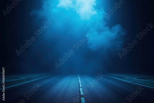 Mysterious foggy road at night with atmospheric blue mist evoking eerie and dreamlike qualities.