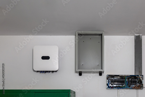 Inverter solar panel in electrical room. Electrical control cabinet of solar cell PV grid tile Inverter system. Save electric bill with innovation technology..