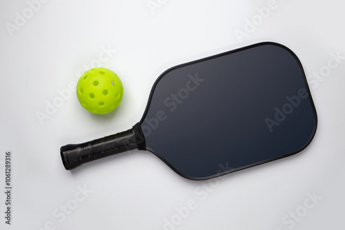 Pickleball Paddle and Ball on a white background