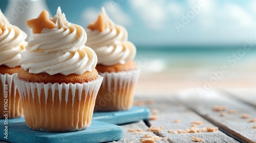 Cupcakes decorated with star-shaped toppings and frosting, with an oceanic themed background on wooden boards, exuding a sense of summer and joyful celebration.