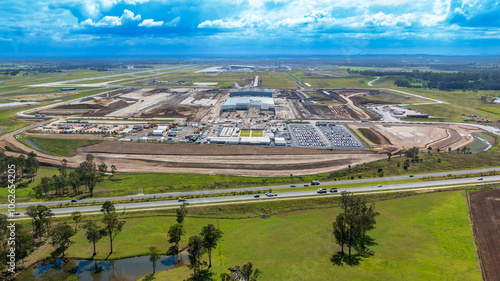 Drone aerial photograph of the new Western Sydney International Airport cargo precinct currently under construction in a large industrial development in greater Sydney, NSW Australia.