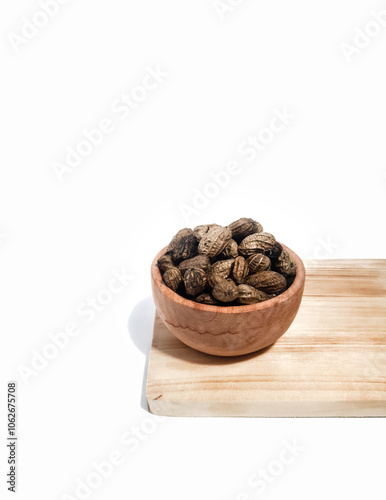 Boiled peanuts or kacang rebus served in wooden bowl