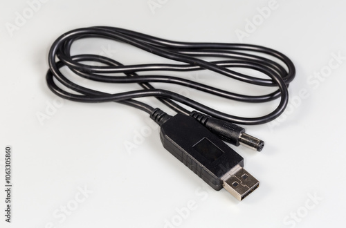 Power cable-adapter with USB and coaxial connectors on edges