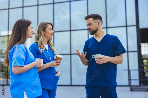 Healthcare Professionals Conversing Outside Hospital During Break