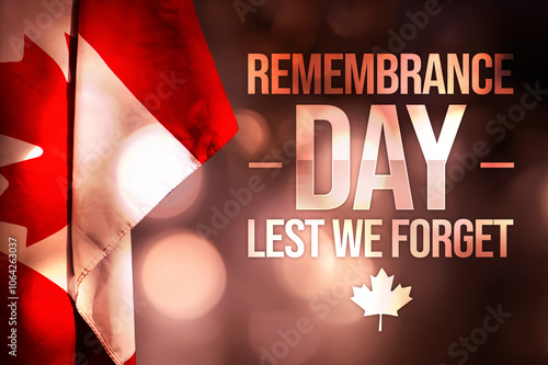 Remembrance Day, lest we forget with Canadian flag on the side along glowing bokeh lights. November 11 is observed as day to remember veterans in Canada, background