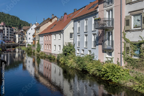 traditional houses on Gross Enz river left bank at touristic village, Bad Wildbad, Germany