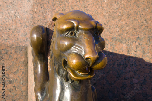 A smiling griffin. The head of the old statue of the griffin (1834) on the University embankment. One of the symbols of St. Petersburg, Russia