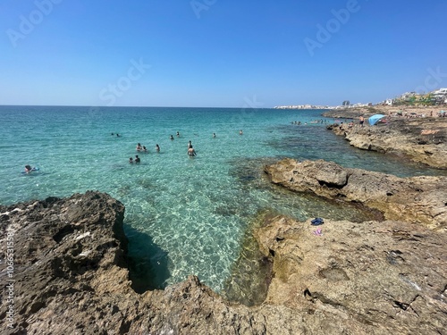 puglia, salento gallipoli cove with clear sea just outside the town