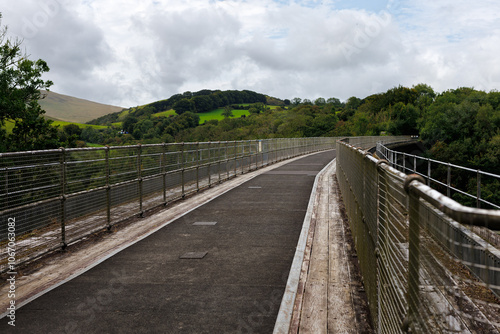 Looking across the top of the Victorian wrought iron Meldon Viaduct, disused railway line and part of the Granite Way, Dartmoor National Park, Devon, UK