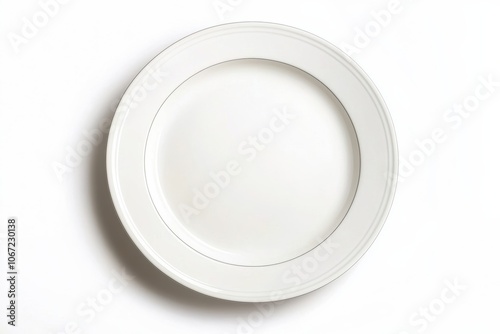 A minimalistic white plate on a clean background, perfect for showcasing food or table settings in a modern dining environment.