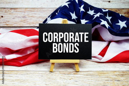 Corporate Bonds text messege with USA flag on wooden background