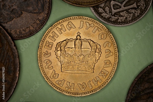 Vintage Yugoslavian coin with crown design.