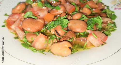 Ful medames or simply foul, is a dish of cooked fava beans served with vegetable oil, lemon It is a popular food in Arab countries.