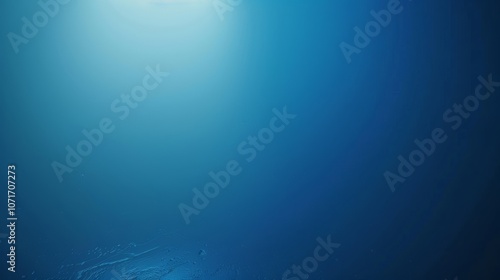 A peaceful blue gradient image suggesting the serenity of deep oceans or vast skies, absent of distinct objects or elements.