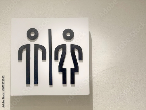 Male and female restroom signs