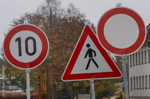 Speed limit, pedestrian crossing and no vehicles road signs showing traffic regulations