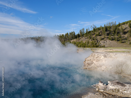 Steam rises from the Excelsior Geyser within Yellowstone Park in Montana