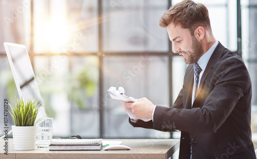 Close Up Of Businessman Taking Folders From Hand