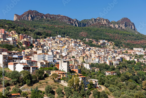 Cityscape of old pictoresque colorful town Jerzu with mountains and green forest vegetation. Province of Nuoro, Sardinia, Italy, Europe