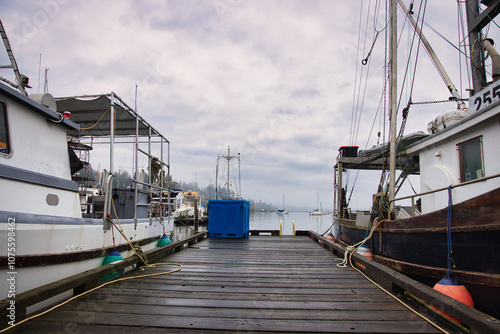 Fishing boat in the dock whit is fishing gear on board. 