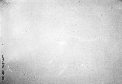 Abstract dirty or aging film. Dust particle and grain texture or dirt use for overlay film frame effect. Dust scratches effect for vintage film grunge textured effect design.