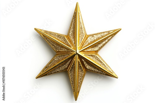 A single gold star sits on a white surface, making for a simple and elegant design