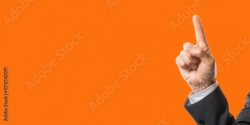 A professional hand gesture signaling an idea or concept in a corporate setting.