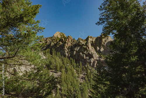 Eldorado Canyon State Park in Colorado. View of mountains along hiking trail on beautiful blue sky afternoon