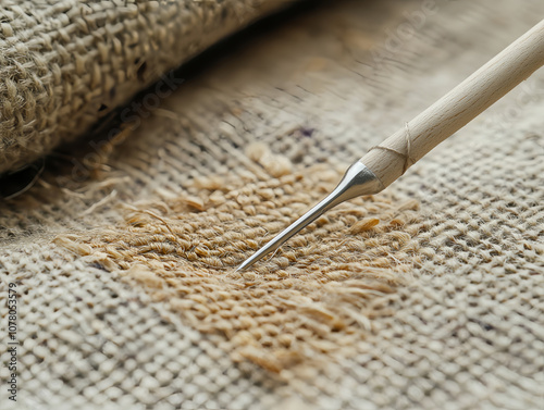 closeup of woven fabric with detailed needlework