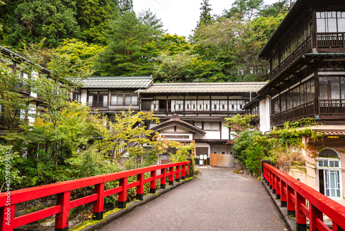 Historic Sekizenkan Ryokan's Main Hall, Built in 17th Century, with Keiun-bashi Red Bridge (Gunma, Japan - October 2024)