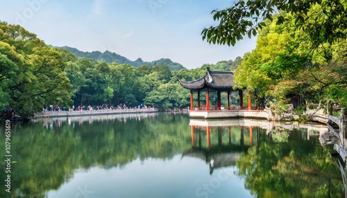 Traditional Chinese Pavilions in Hangzhou’s West Lake Surrounded by Lush Gardens and Reflective Waters, Creating a Serene Cultural Landscape Perfect for Peaceful Meditation and Photography