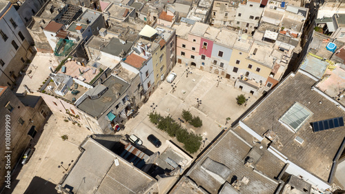 Aerial view of a small square in the historic center of Bisceglie, in Puglia, Italy.