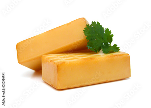 Cubes of cheddar cheese isolated on white