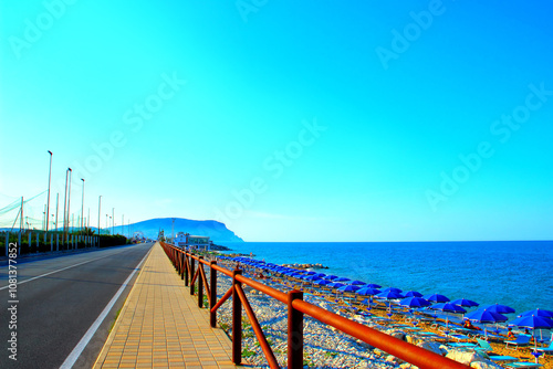 PORTO RECANATI (SCOSSICCI), ITALY - CIRCA JUNE 2021: Walk by the Adriatic Sea in Scossicci. A tourist location for over a century, with multiple Blue Flag awards and a view of Mount Conero