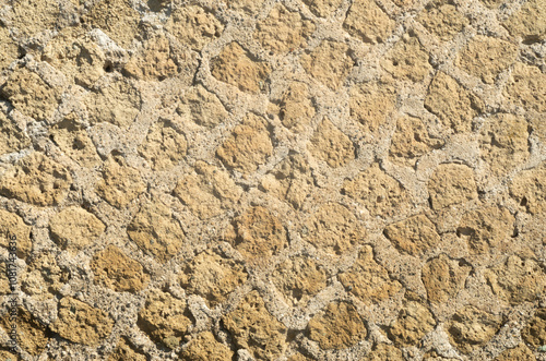 Part of roman wall from tufa stones (Opus reticulatum) in Italy