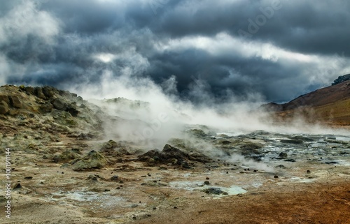 Geothermal landscape with steaming vents.