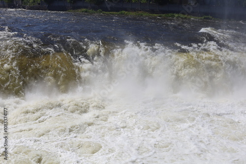 The threshold of the waterfall. The rushing water.