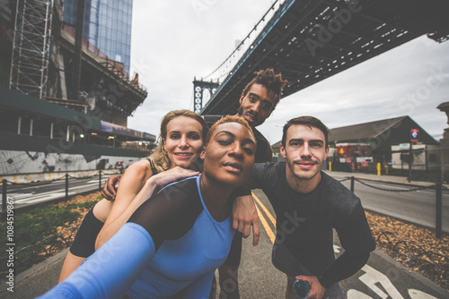 Group of urban runners running on the street in New york city, conceptual series about sport and fitness